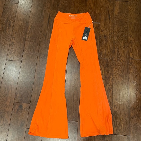Sustainable Wolven Flared Crossover Waistband Tangerine Leggings - Picture 2 of 9
